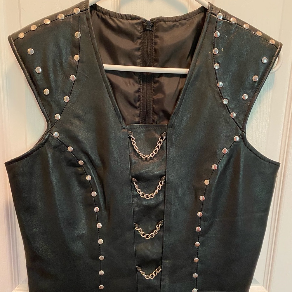 Women’s black leather top.